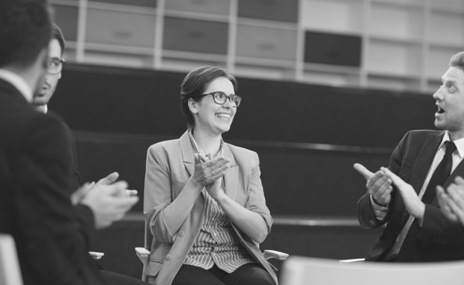 Students reviewing financial documents together in casual study environment